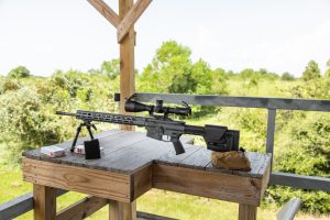 AR 10 gun on a shooting bench